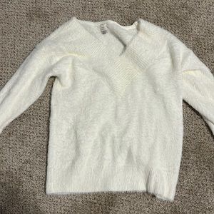 White fuzzy sweater with v neck